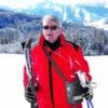 Inogen Rove 6 portable concentrator worn by man skiing